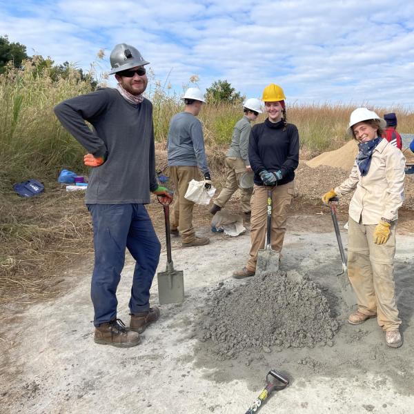 Members moving gravel
