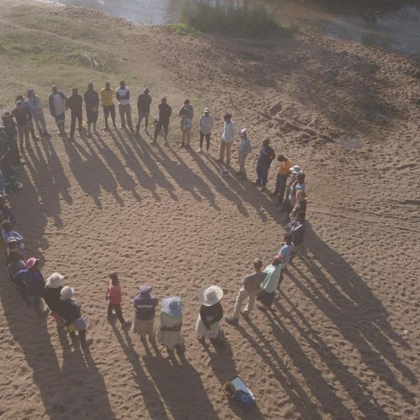 The community gathers for the end of the day circle