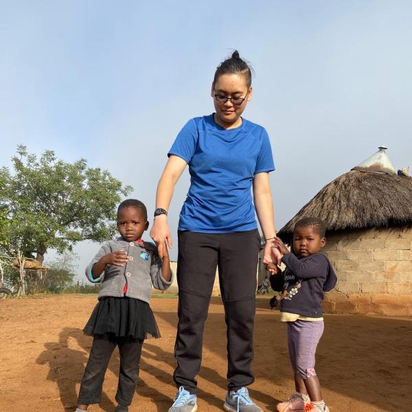 Nina with local children
