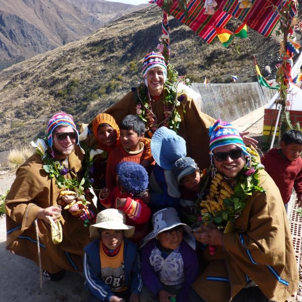 locals and builders in front of the bridge