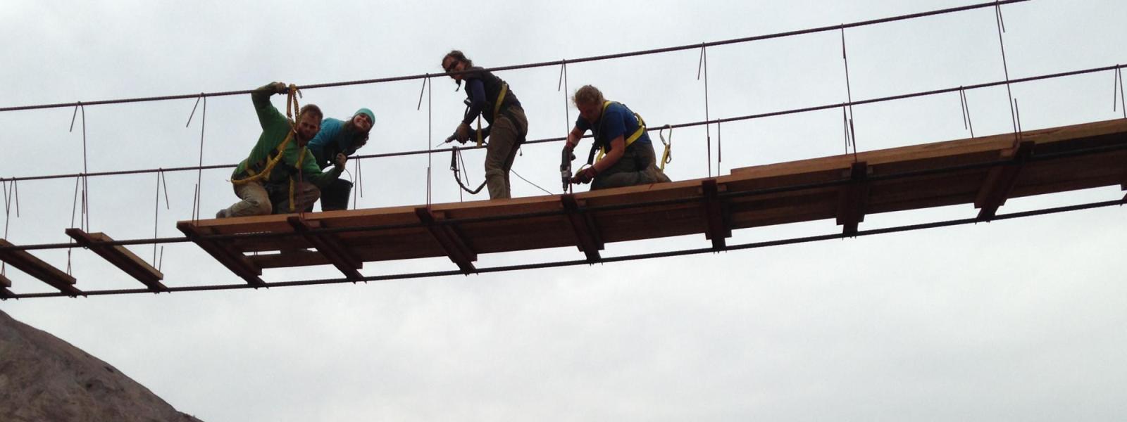 2015 bridge - Members putting up walkway