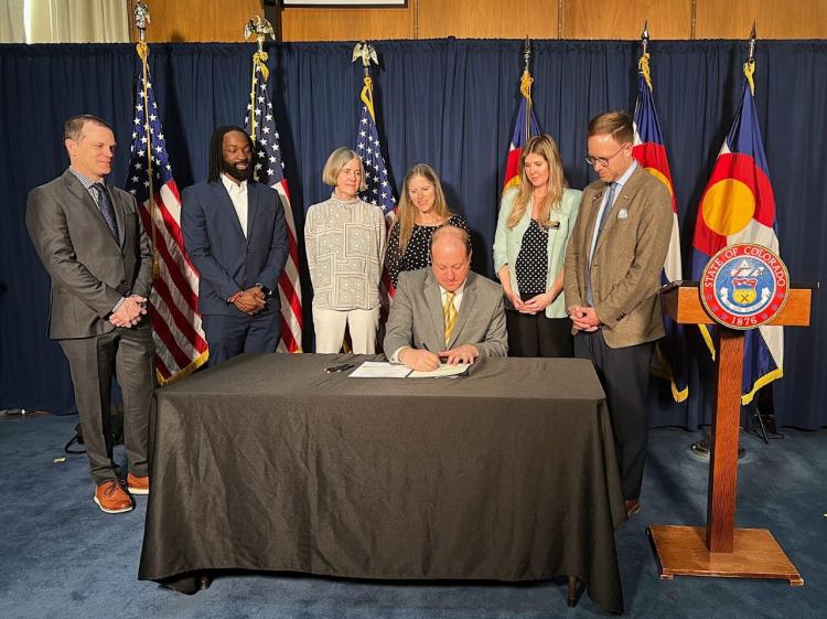KWIP's first bill signed into law