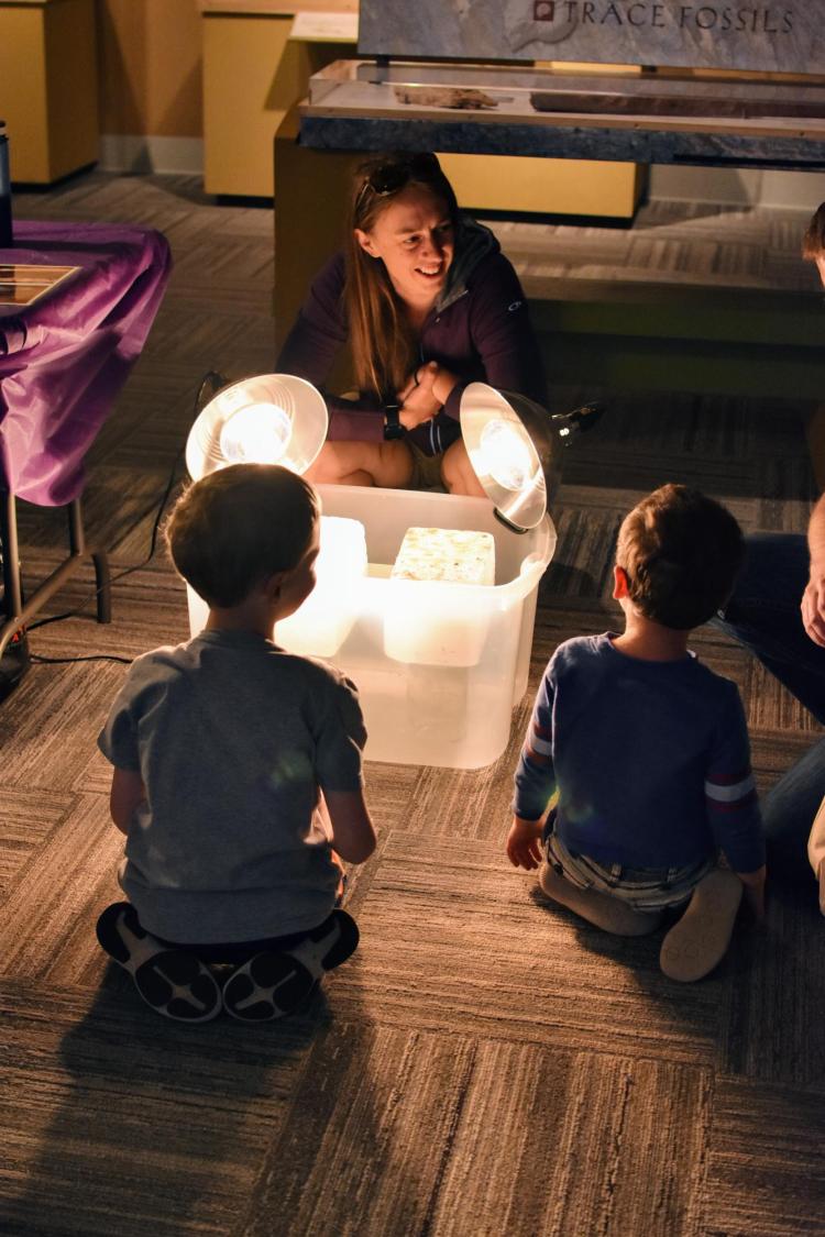 Woman teaching children