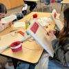 kids doing needlework