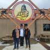 Student from the Native Voices program stand in front of the Turtle Mountain Community School in South Dakota