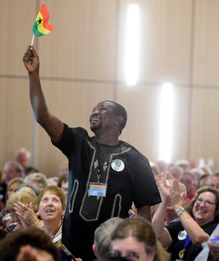Bedzra Dela Quarcoo, of Ghana, waves to the crowd after he is introduced. Friendship Force International brought more than 400 international visitors to Boulder this week for its 2019 World Conference at University of Colorado Boulder.