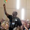 Bedzra Dela Quarcoo, of Ghana, waves to the crowd after he is introduced. Friendship Force International brought more than 400 international visitors to Boulder this week for its 2019 World Conference at University of Colorado Boulder.