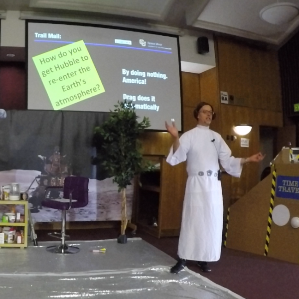 Chris dressed as Princess Leia reading trail mail