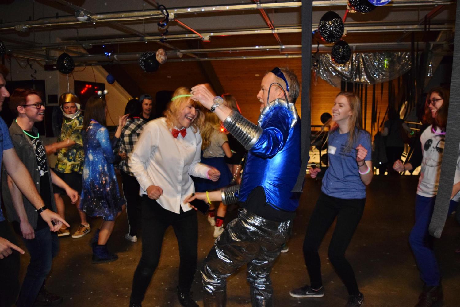 Chris and students dancing
