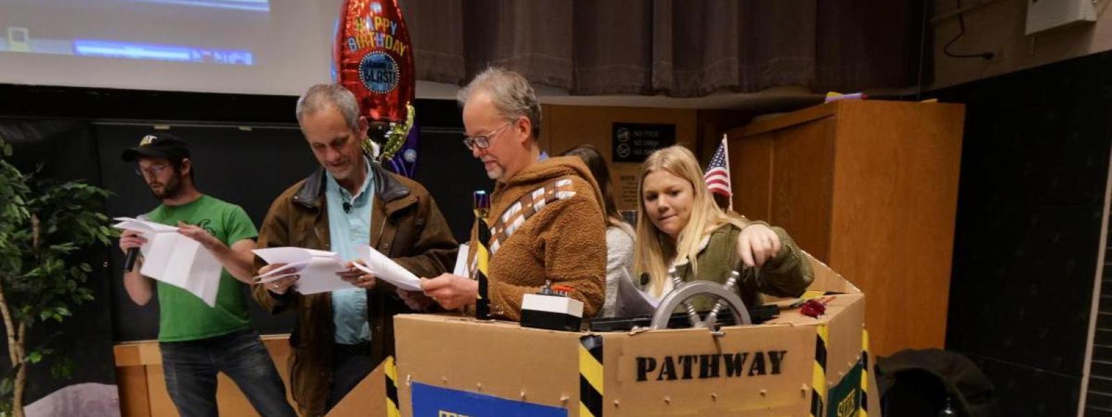 Chris and Pathway students taking part in a skit
