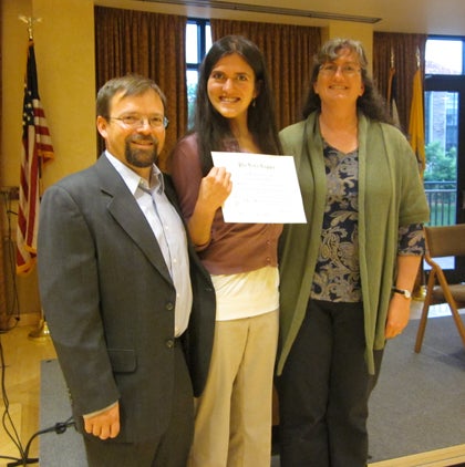 student receiving certificate