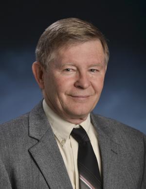 Headshot of John Cumalat