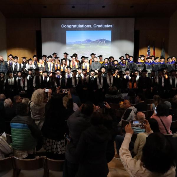 Group photo of graduating students at physics recognition ceremony