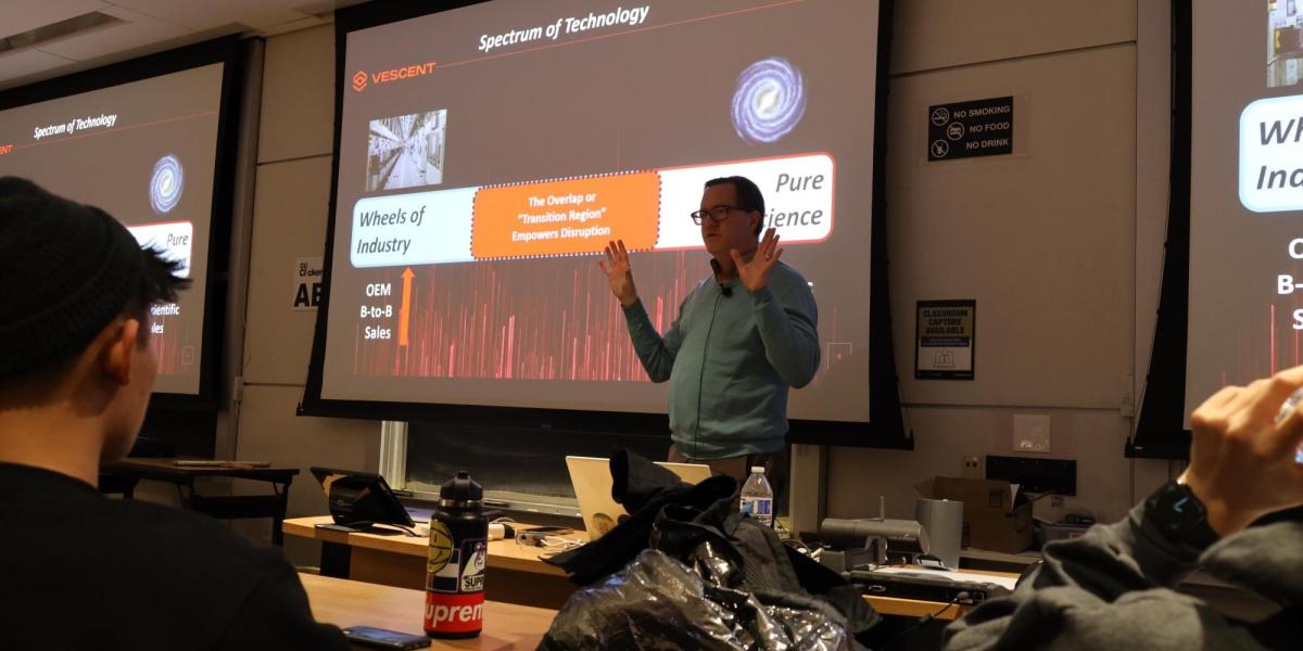 Scott Davis talks to students in the quantum scholars program