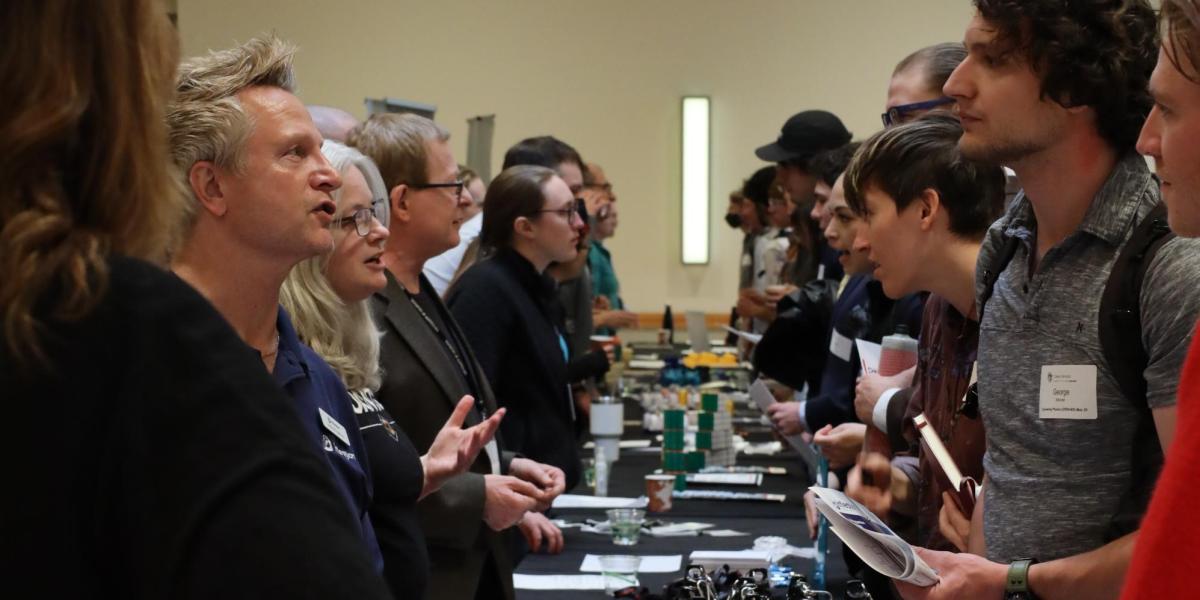 Students and employers connect at a career fair