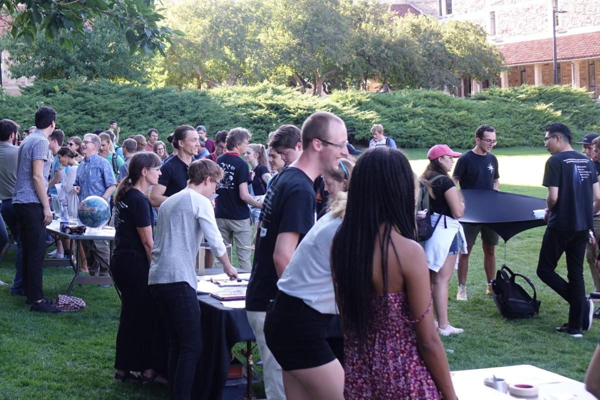 Group of people on the Duane Physics lawn