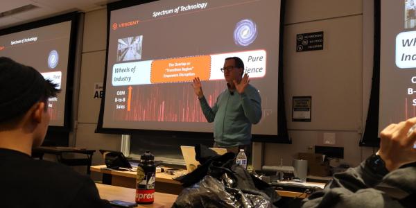 Scott Davis talks to students in the quantum scholars program
