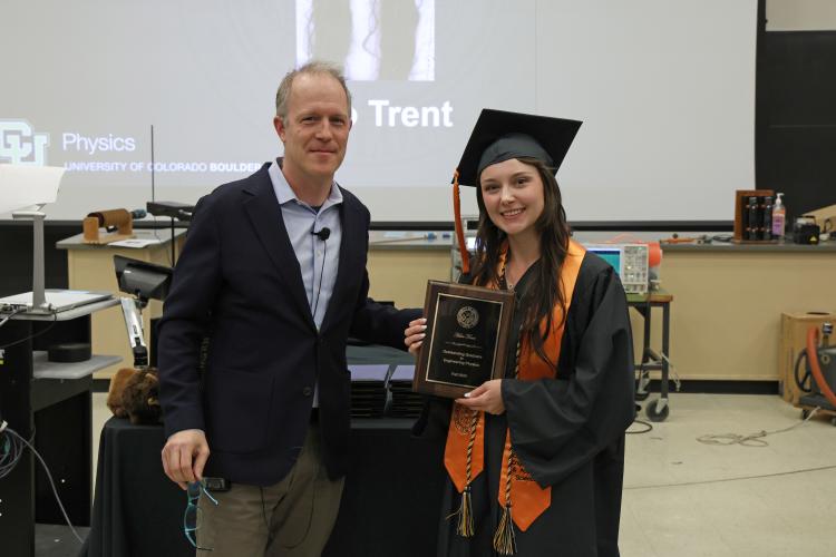 Physics Chair Tobin Munsat and Hero Trent at graduation.