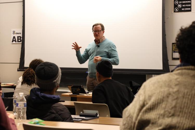 Scott Davis speaks with students in the Quantum Scholars program