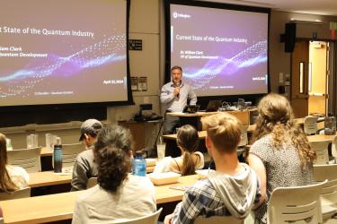 Dr. William Clark speaks to the Quantum Scholars students