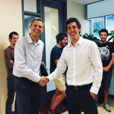 Konrad Lehnert and Ben Chapman shaking hands