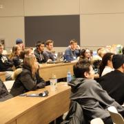 Students in the Quantum Scholars program listen to a presentation.