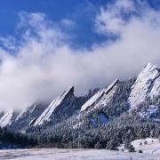 Snow-covered flat iron mountains