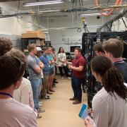 Quantum scholars students visit a lab at NIST