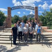 REU students pose for a photo at Farrand Field