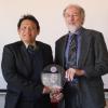 Dr. Sethapan (Seth) Krajangwongs presents the Friend of Thai Science Award to Noel Clark