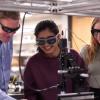 Scott Diddams pictured in the lab with students