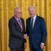 Charles Hull and President Joe Biden shaking hands