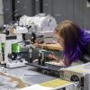 Student conducting physics research 