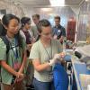 REU participants visit a research lab