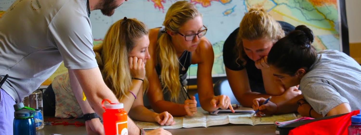 Students learning how to use a map and compass for the 2016 Applied Leadership Wilderness Course