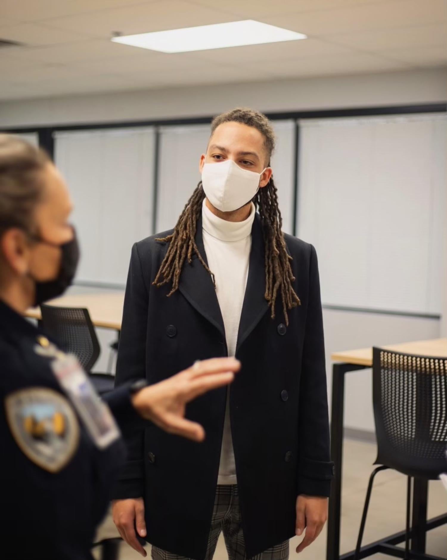CU Boulder student Isaiah Chavous listens to Chief Doreen Jokerst during the commander hiring process