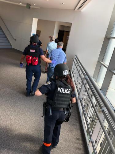 Officers and firefighters participate in active harmer response training