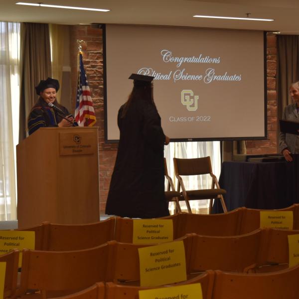 Student accepting diploma