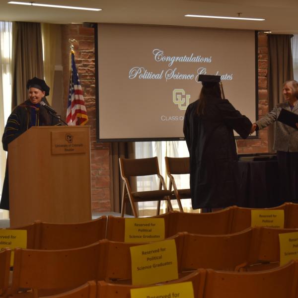 Student accepting diploma