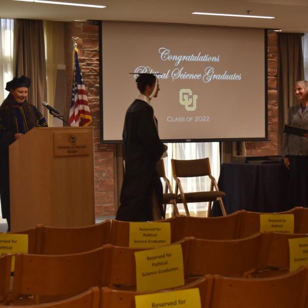Student accepting diploma