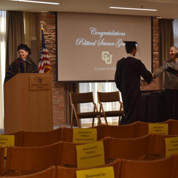 Student accepting diploma