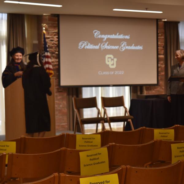 Student accepting diploma