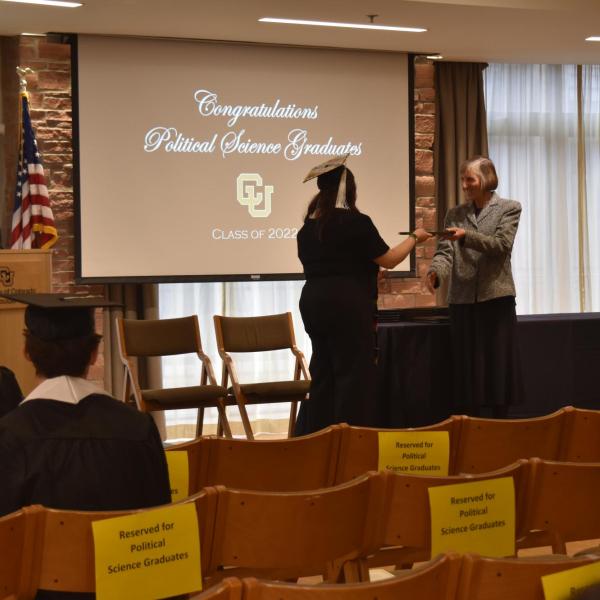 Student accepting diploma