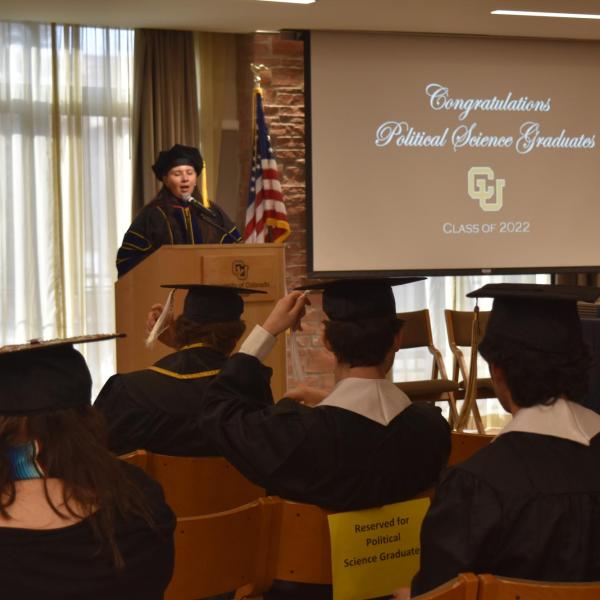 Student accepting diploma