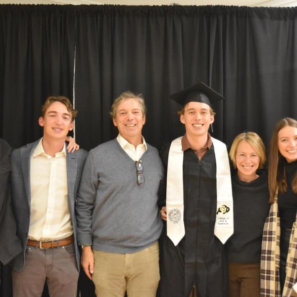 Graduate with family/friends