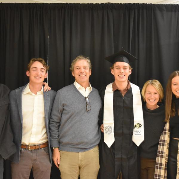 Graduate with family/friends