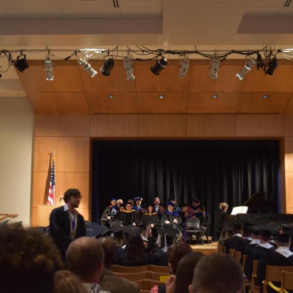 Faculty on stage