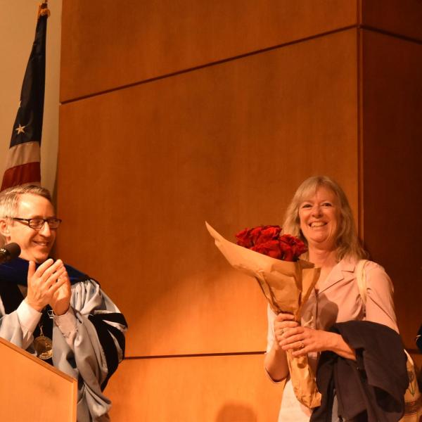 Carol Receiving Flowers