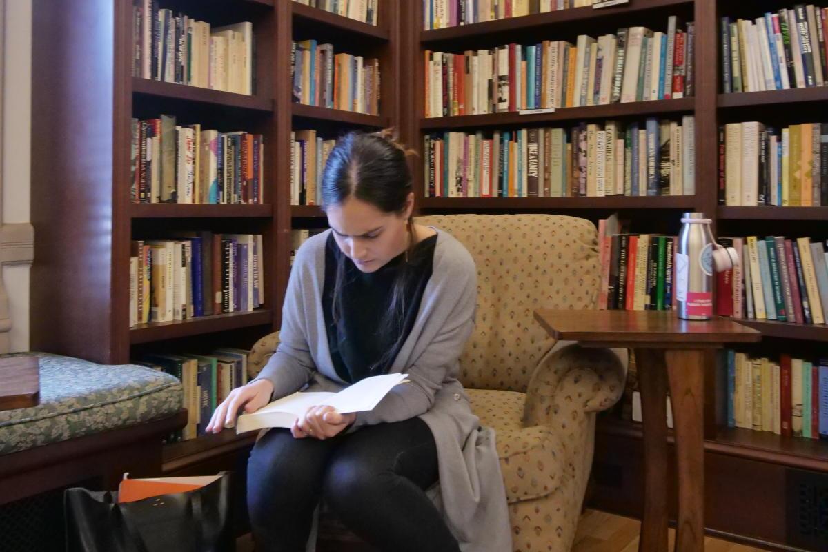 girl reading in library