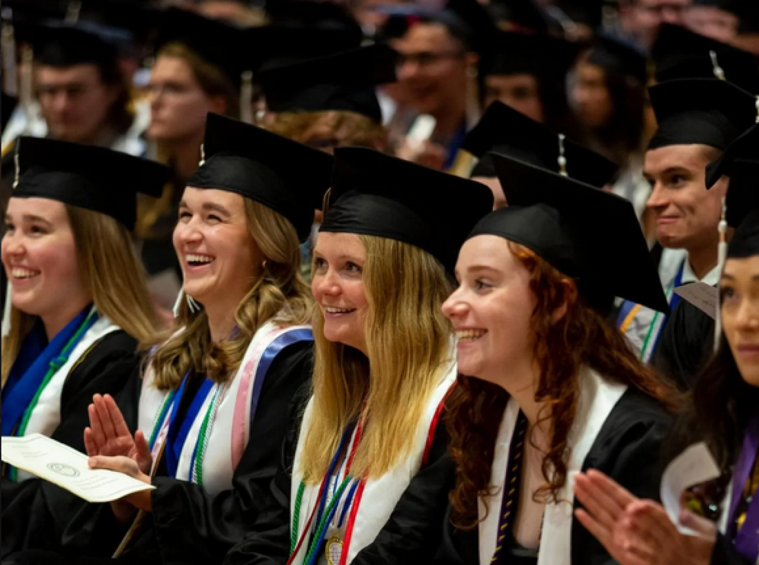 Graduates smiling